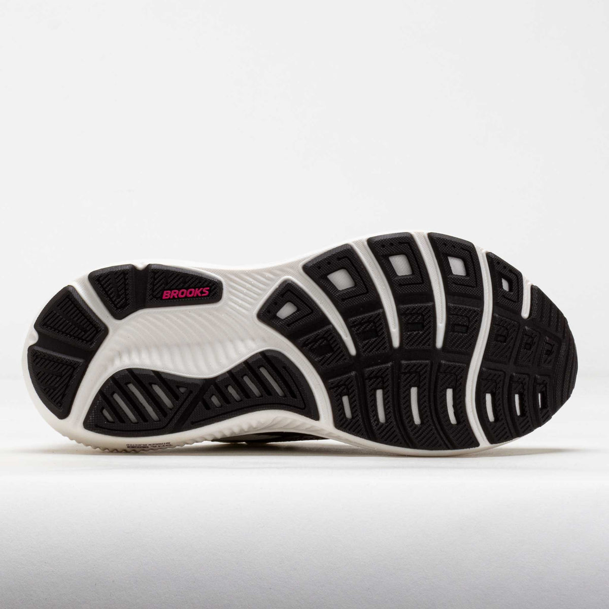 Bottom sole view of Brooks Ghost 18 women's running shoe showing tread pattern