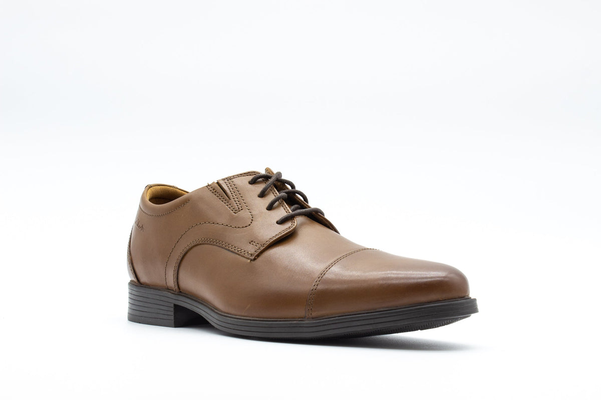 Clarks men's leather cap-toe Oxford dress shoe with dark laces and rubber sole