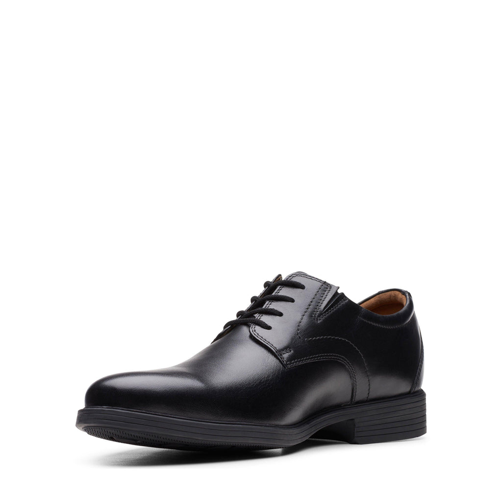 Clarks men's plain toe leather Oxford dress shoe with lace-up closure and cushioned insole