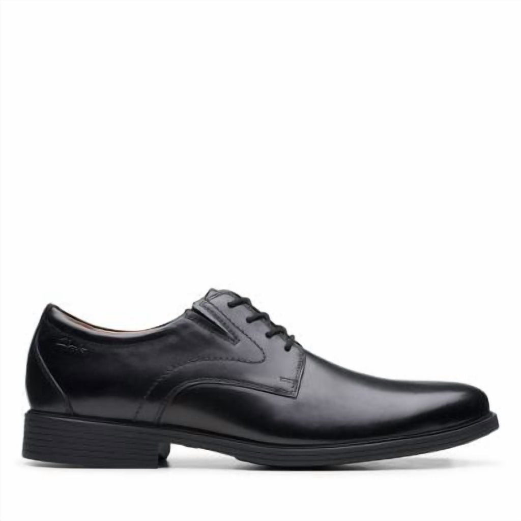 Clarks men's plain toe Derby dress shoe with lace-up closure and leather upper, lateral view