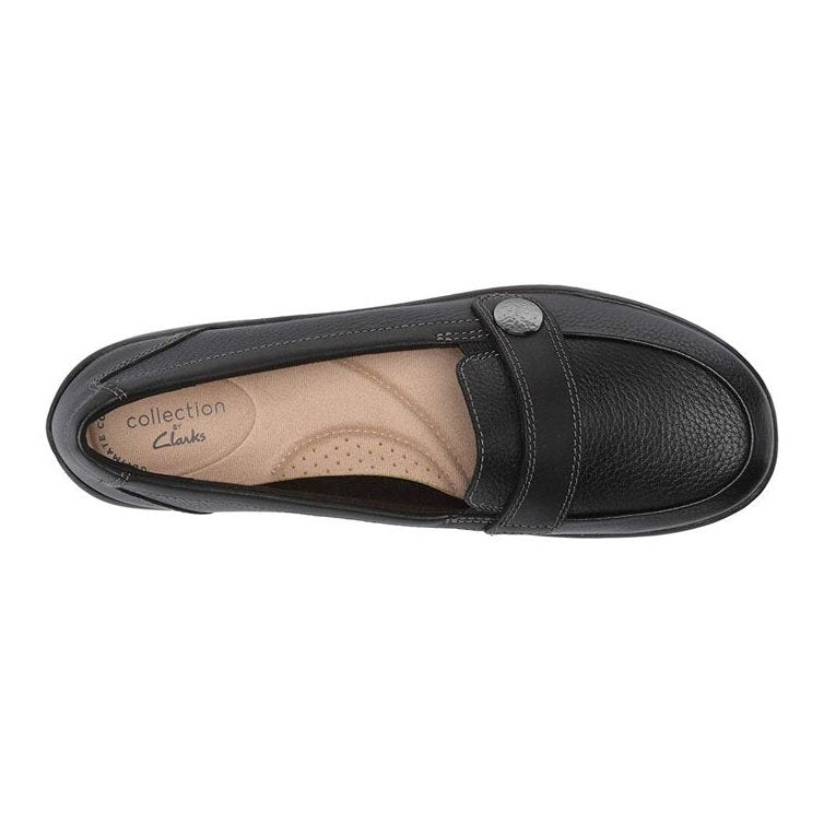 Top-down view of a black leather slip-on loafer with single strap and silver button detail