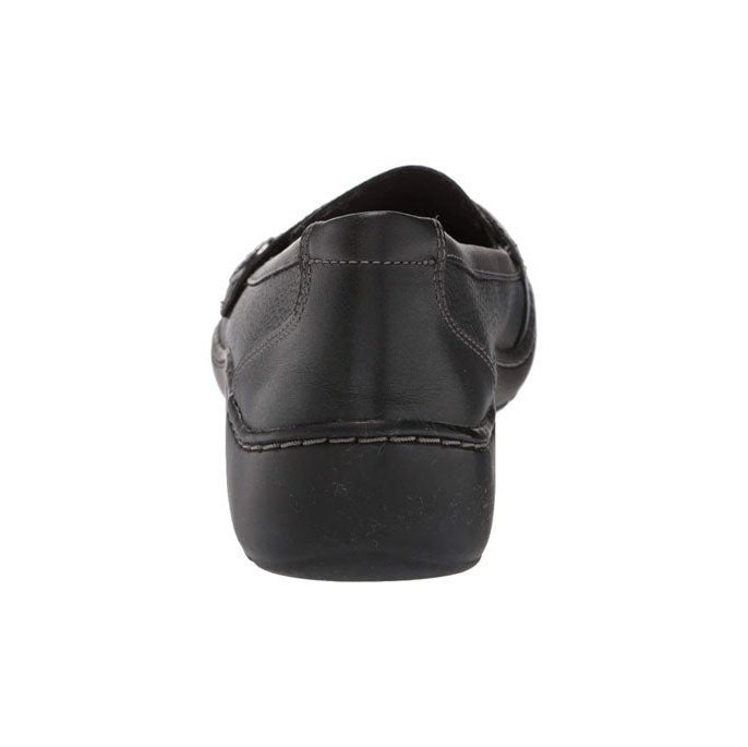 Rear view of a black leather slip-on shoe with low stacked heel and contrast stitching