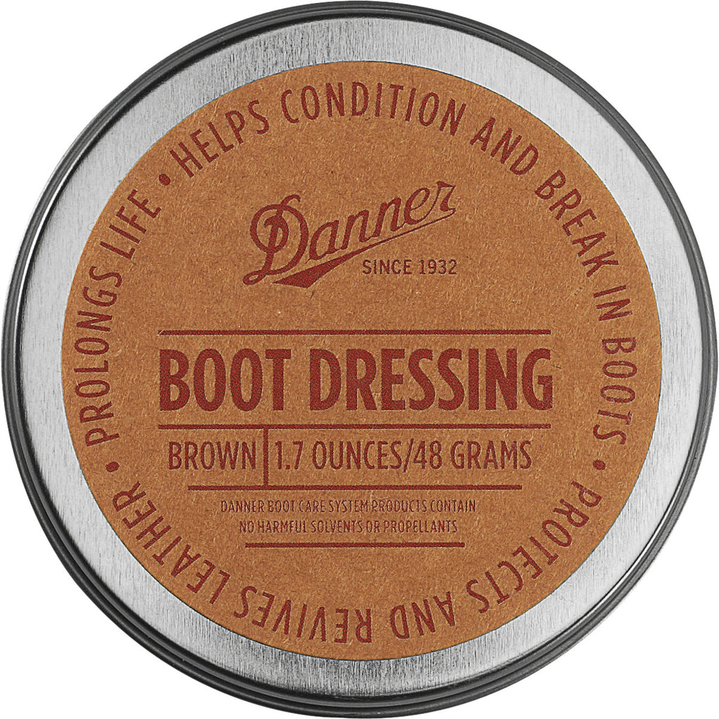 Danner Boot Dressing tin lid showing brand logo, brown color, and 1.7 ounce size