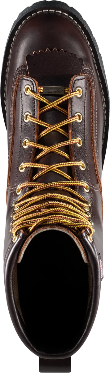 Top-down view of a brown leather lace-up work boot with gold eyelets and braided laces