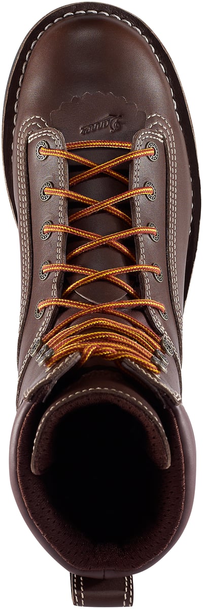 Top-down view of a brown leather lace-up work boot with orange laces and Danner logo