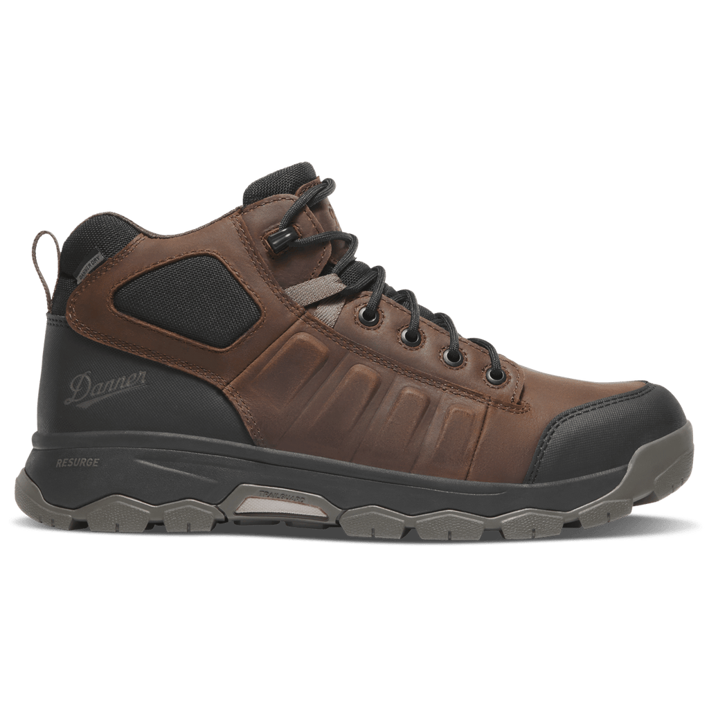 Danner men's mid-cut hiking boot with brown leather upper and olive rugged outsole