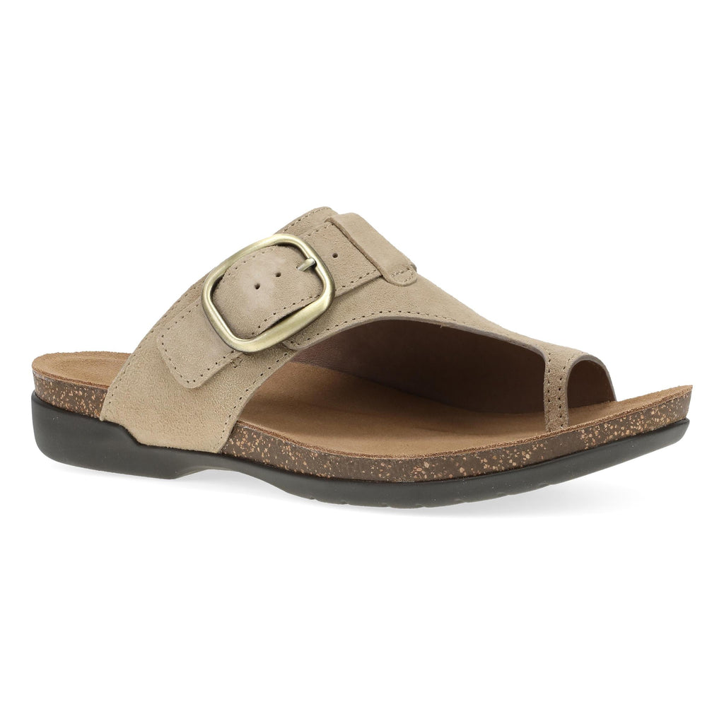 Dansko women's slide sandal with oversized gold buckle and cork-speckled footbed