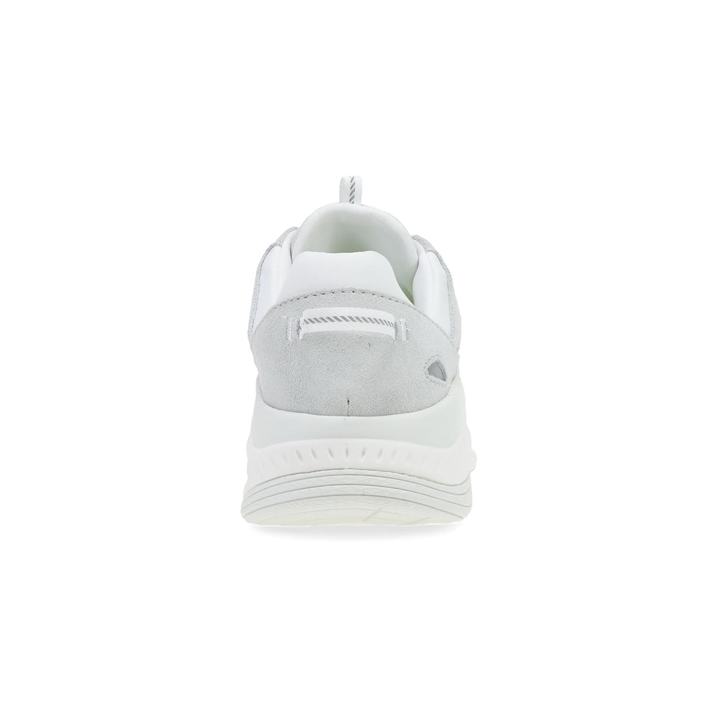 Rear view of a grey suede and white sneaker with chunky sole and heel loop