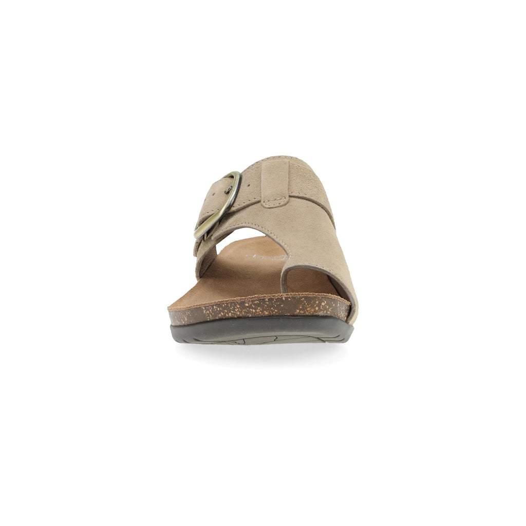 Front view of a women's slide sandal with large buckle strap and cork-speckled footbed