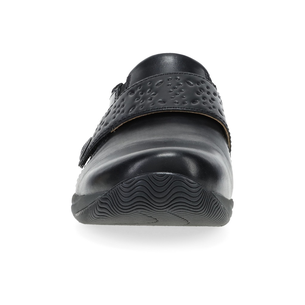 Dansko Sallie clog front view showing textured strap and wavy rubber sole