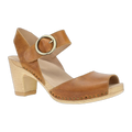 Dansko women's heeled clog sandal with ankle strap, gold buckle, and wooden platform sole