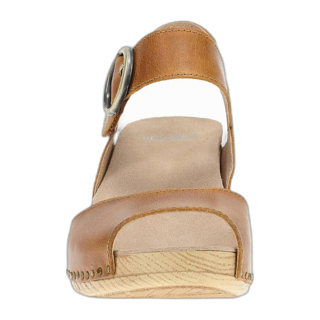 Front view of a tan leather wedge sandal with ankle strap and wooden clog sole