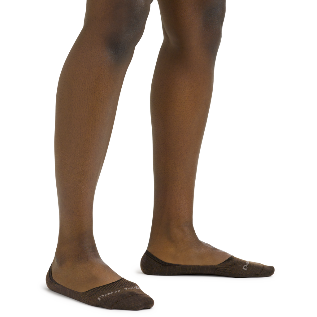 Model wearing Darn Tough no-show invisible socks in dark brown espresso colorway