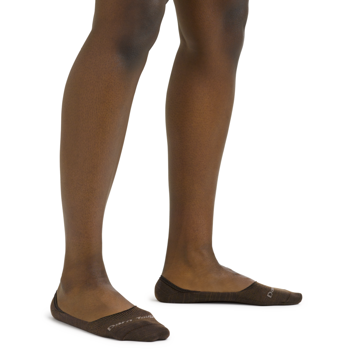 Model wearing Darn Tough no-show invisible socks in dark brown espresso colorway