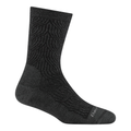 Darn Tough women's crew sock with cable knit pattern and cushioned sole on white background