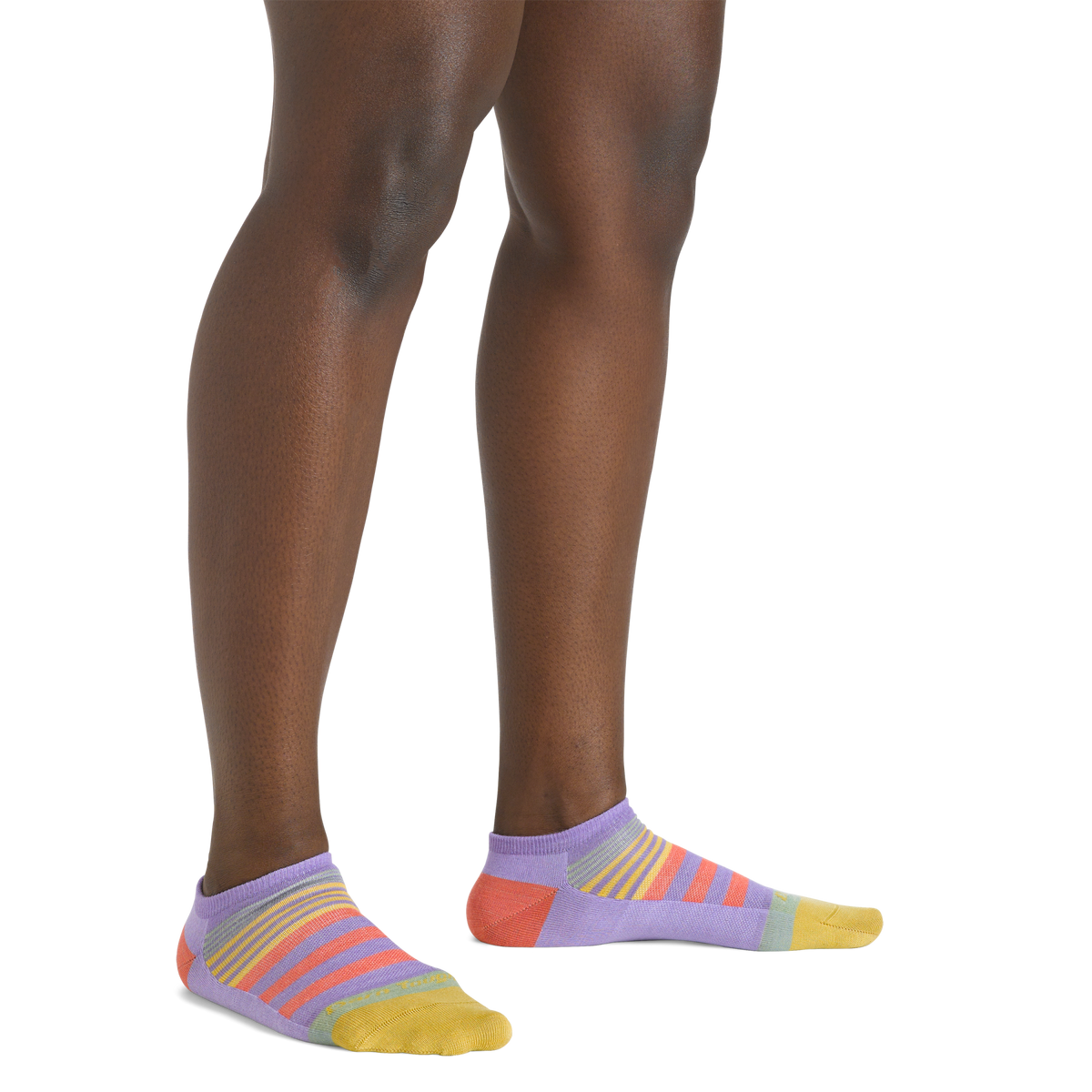 Model wearing lavender no-show ankle socks with multicolor stripe detail on toes