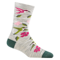 Darn Tough women's crew sock with hummingbird and pink floral pattern on light gray background