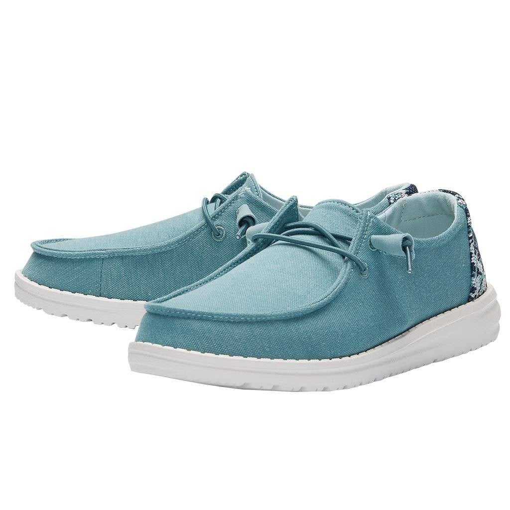 Hey Dude Wendy women's teal canvas slip-on shoes with white sole