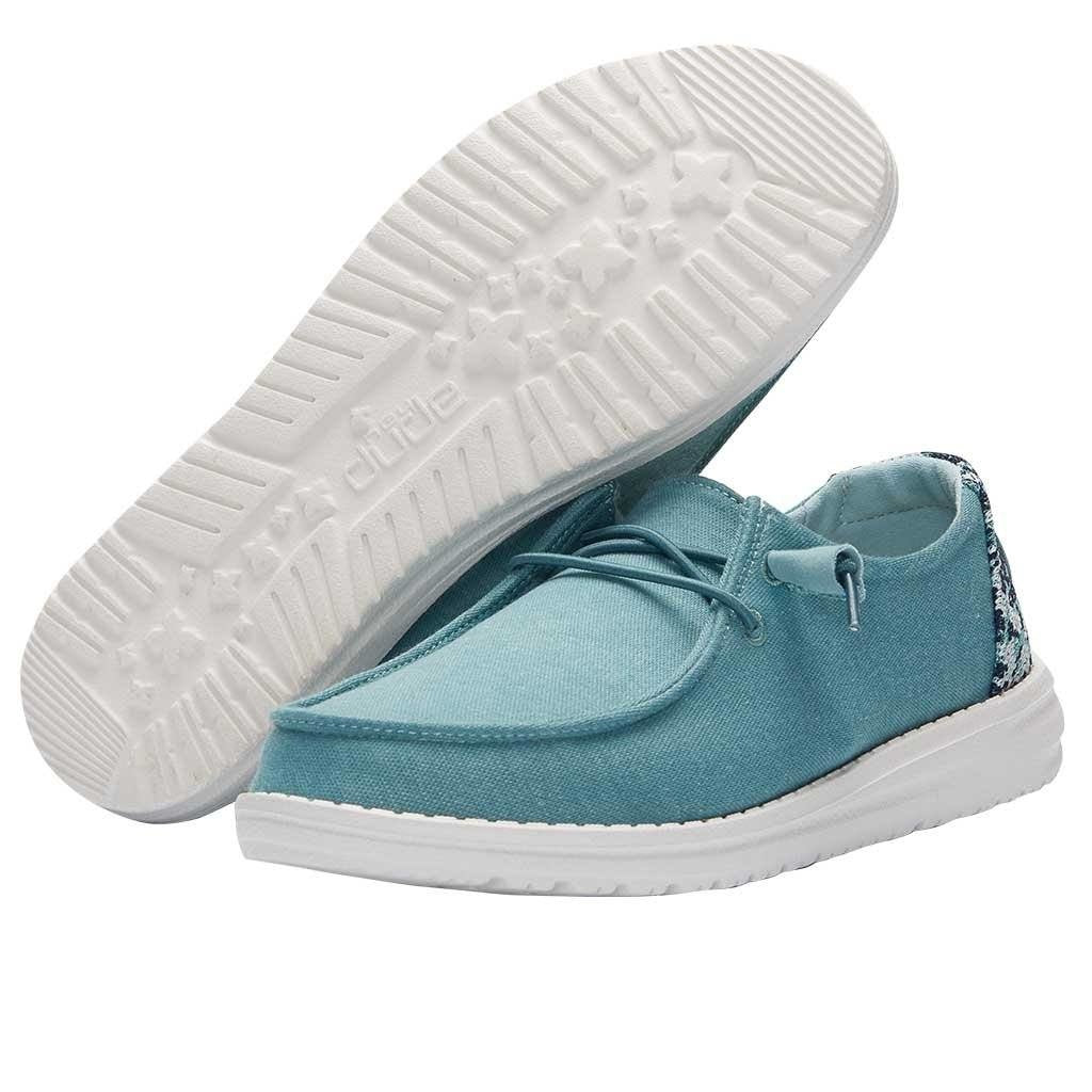 Hey Dude Wendy teal canvas slip-on shoes with white sole and lace detail