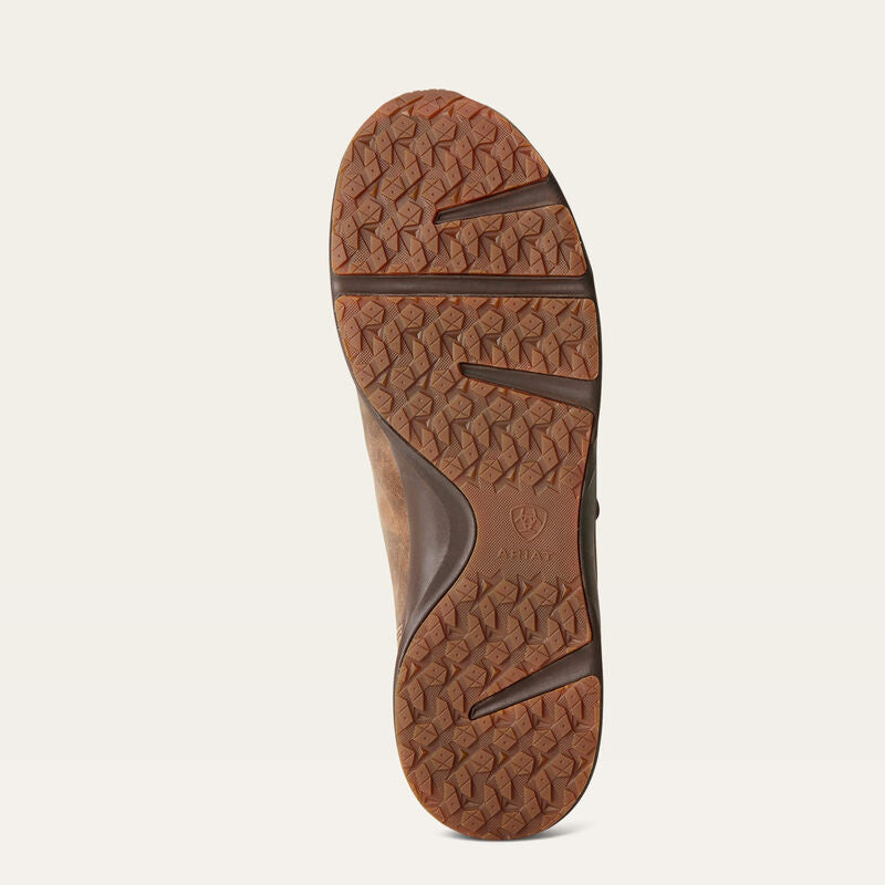Ariat Men's Spitfire shoe showcasing rugged textured outsole with aggressive traction lugs and arch support