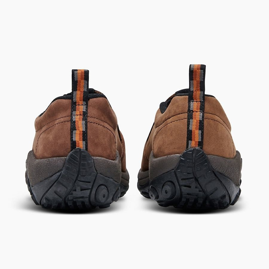 Merrell Mens Jungle Moc Nubuck WP slip-on shoes shown from rear angle, highlighting rugged outsole and pull tab