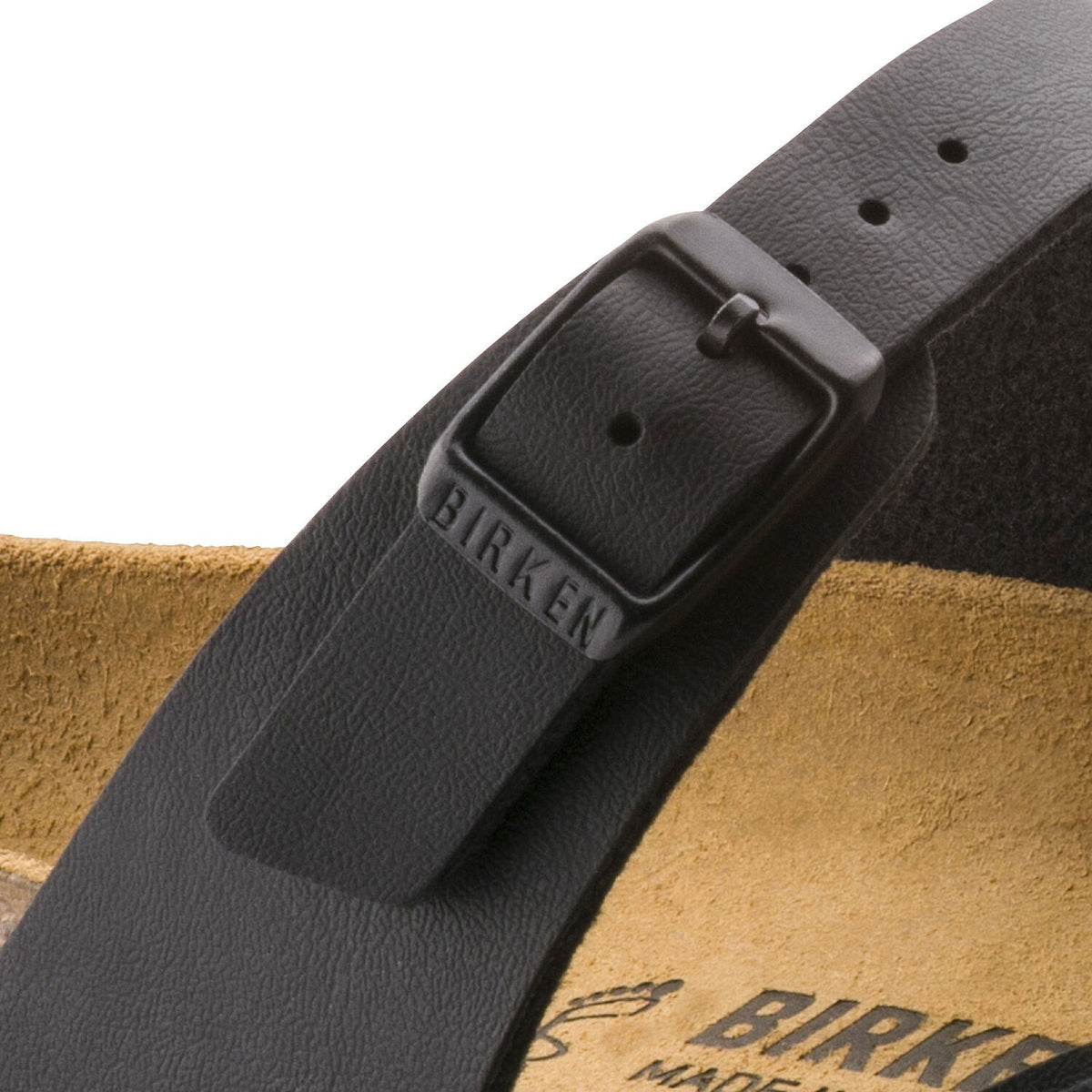 Birkenstock Mayari black sandal strap closeup showing branded buckle and suede footbed