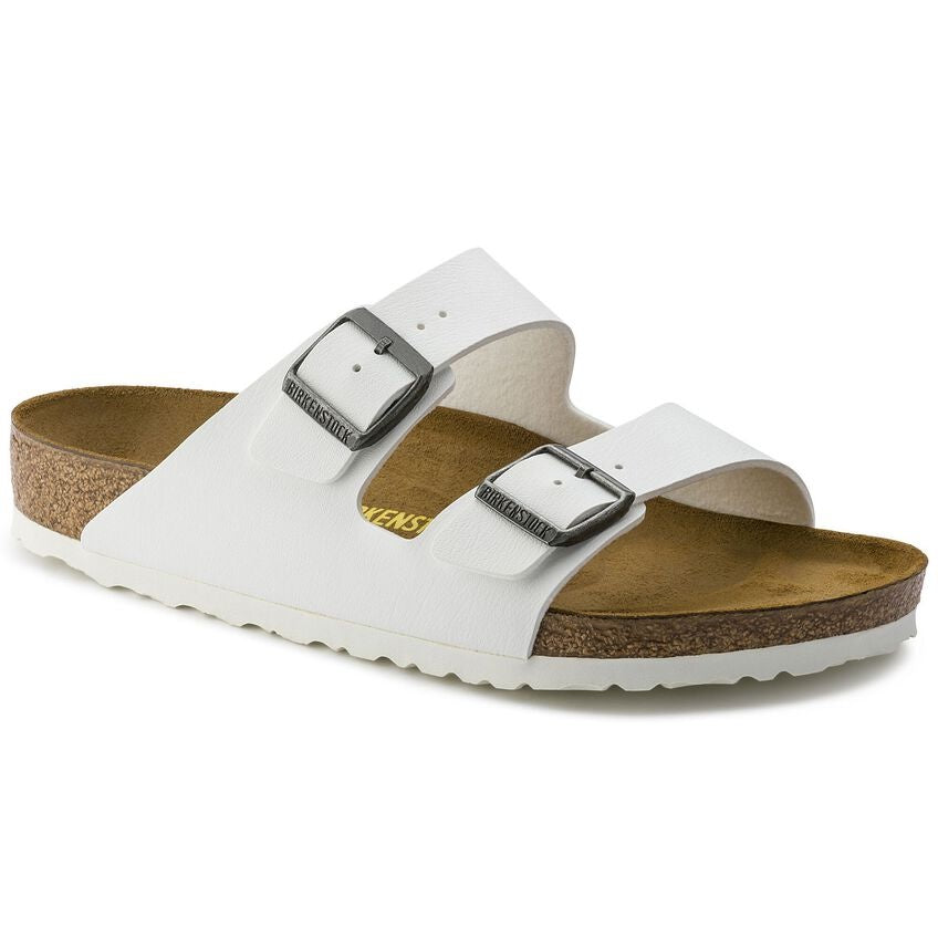 Birkenstock Arizona white two-strap sandals with silver buckles and cork footbed