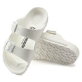 Kids white EVA Birkenstock Arizona sandals with two buckle straps and textured sole