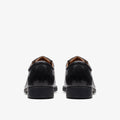 Clarks Whiddon Cap black leather dress shoes shown from rear angle as a pair