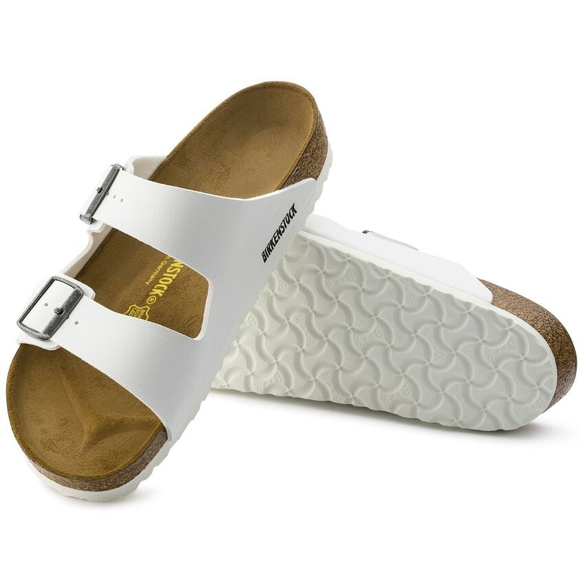 Birkenstock Arizona white sandals with two buckle straps and cork footbed