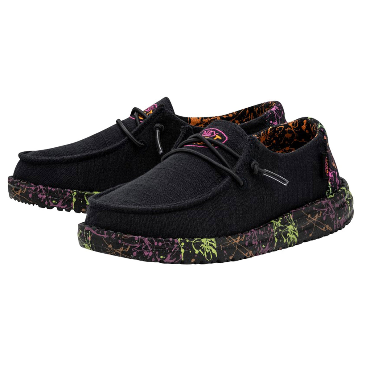 Hey Dude Girls Wendy Glo slip-on shoes with neon splatter sole and lace detail