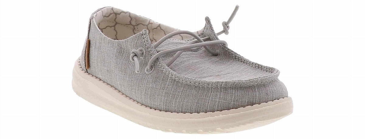 Toddler slip-on casual shoe with knit upper, lace detail, and white sole
