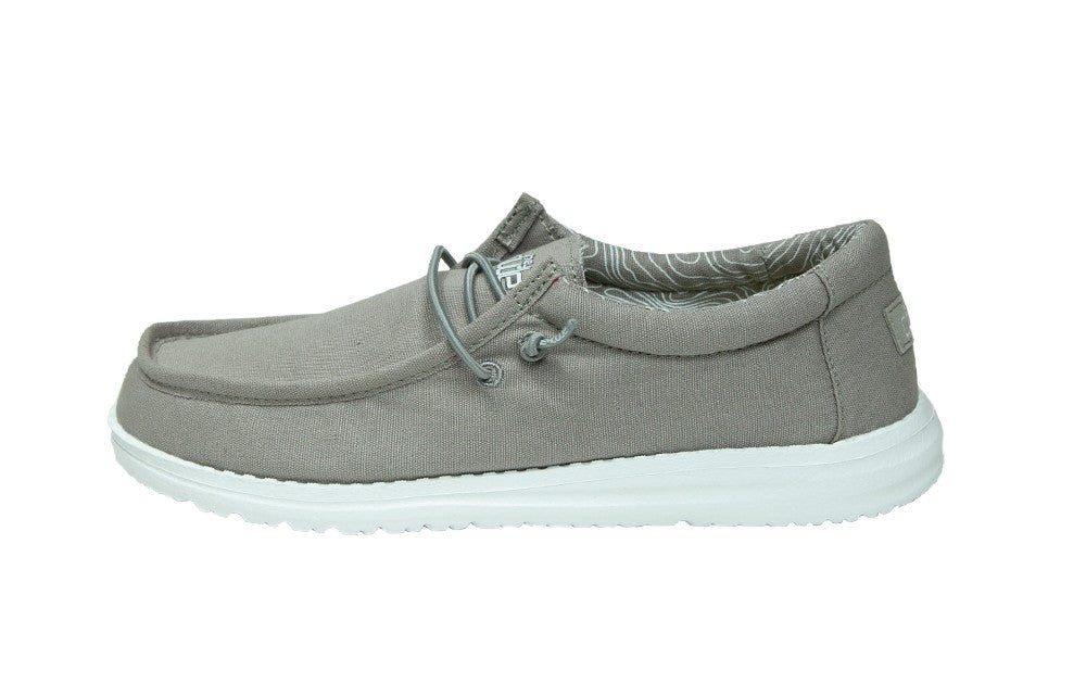 Hey Dude Boys Wally slip-on canvas shoe with elastic lace and white sole, lateral view