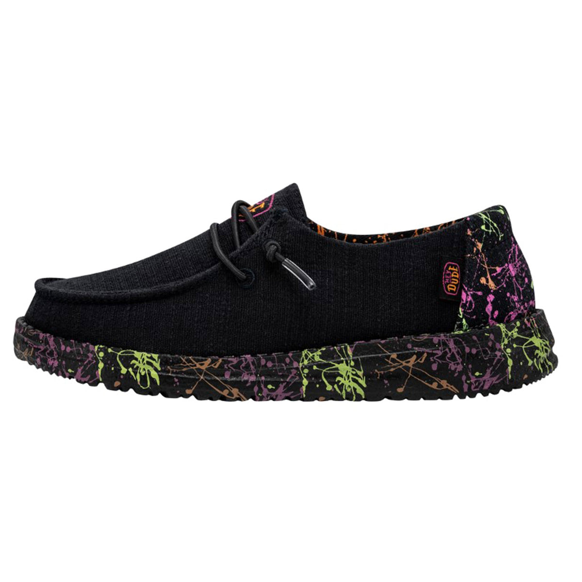 Hey Dude Girls Wendy slip-on shoe with neon paint splatter sole, side view