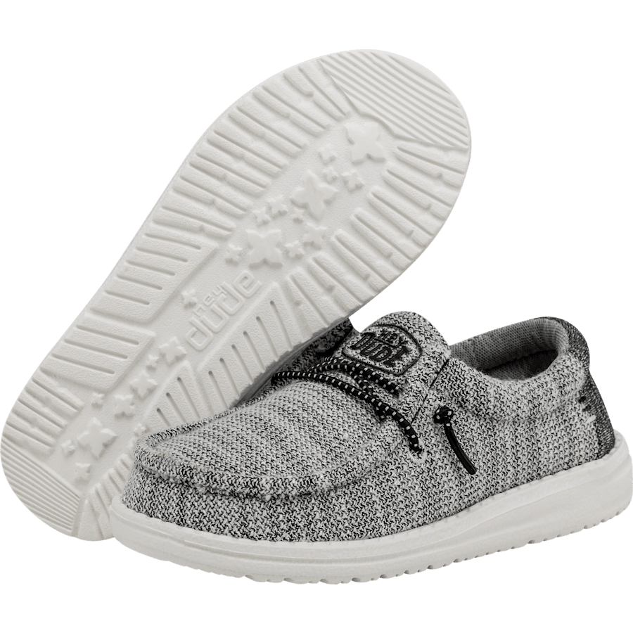 Hey Dude Boys Wally Stretch slip-on shoe shown from side and sole angles