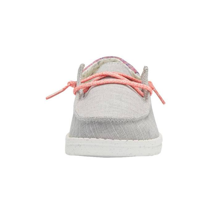 Front view of a grey canvas slip-on shoe with coral laces and white sole