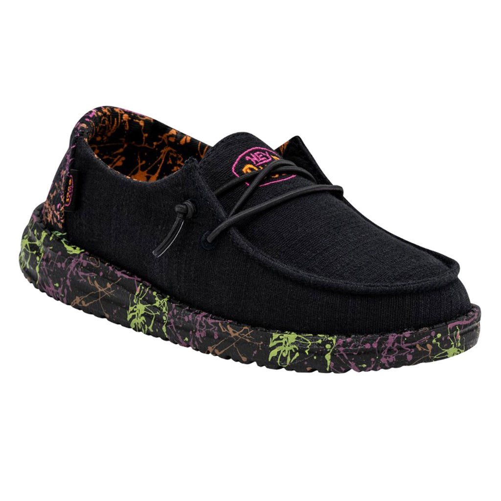 Hey Dude Girls Wendy slip-on shoe with black upper and colorful splatter-print sole