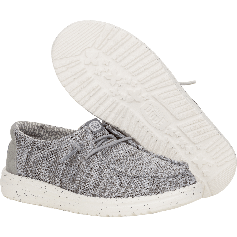 Hey Dude boys youth slip-on knit sneaker shown from side and sole angles