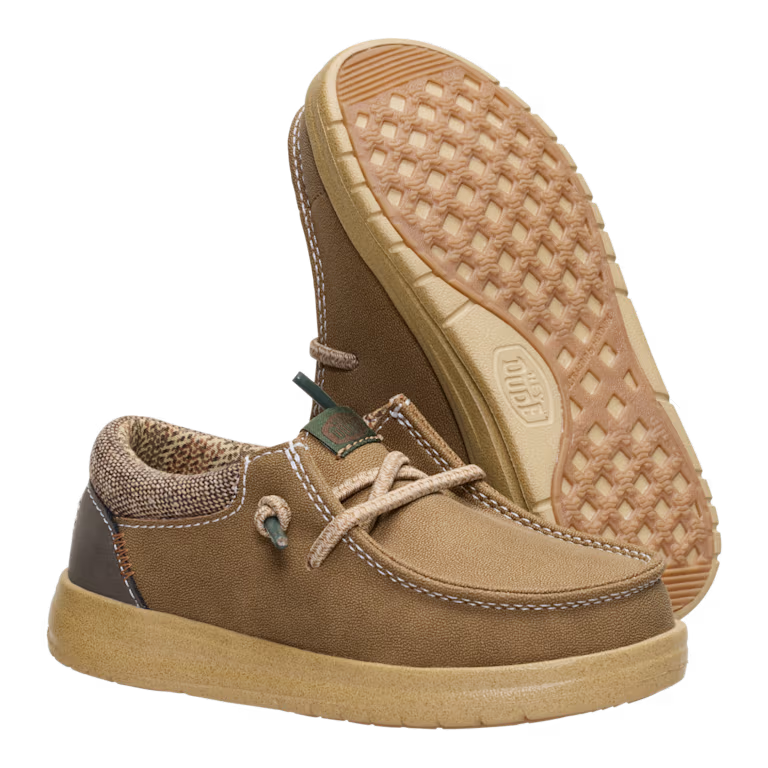 Hey Dude Boys Paul Toddler Classic shoe shown alongside its textured rubber outsole tread
