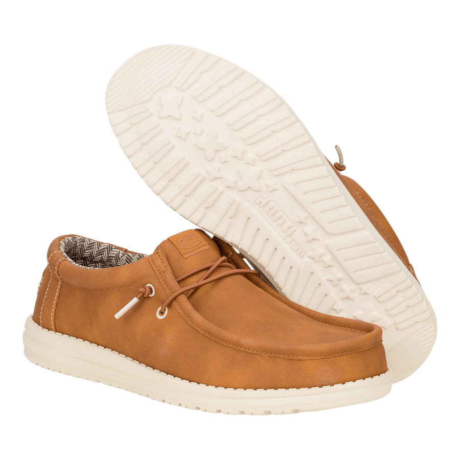 Hey Dude Wally Classic slip-on shoes with lace detail and white sole, shown from side and bottom angles