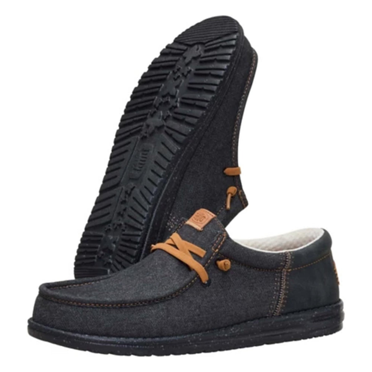 Hey Dude mens slip-on casual shoe showing sole and side view with tan lace detail