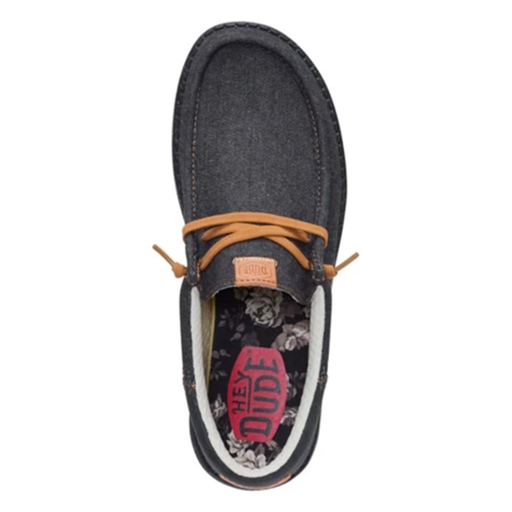 Hey Dude Wally Funk Denim slip-on shoe top view showing floral interior lining