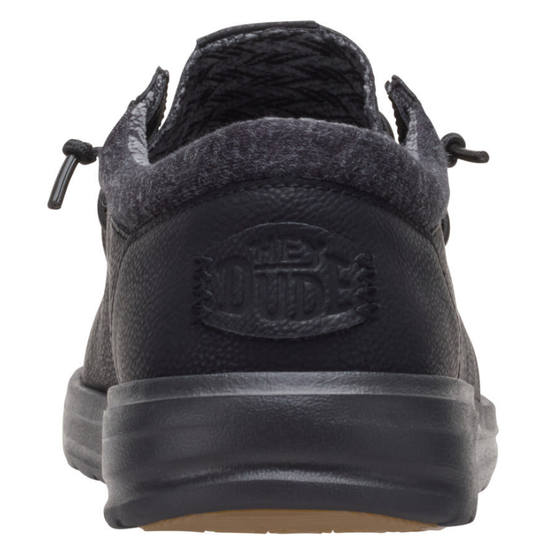 Hey Dude mens casual slip-on shoe heel view showing embossed brand logo