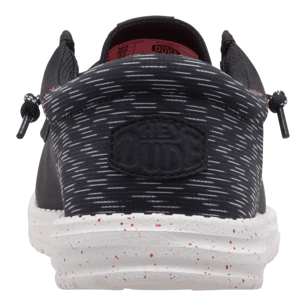 Hey Dude Wally Funk slip-on shoe rear view showing jacquard upper and speckled sole