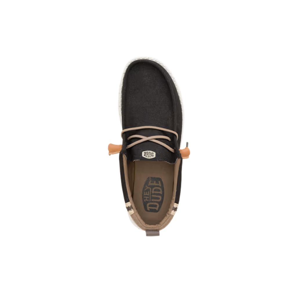 Top-down view of Hey Dude Wally slip-on shoe with lace detail and branded insole