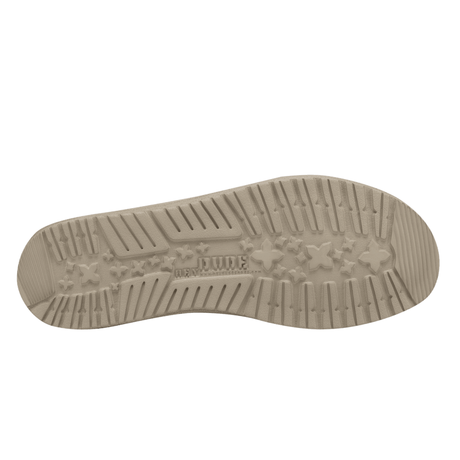 Bottom sole view of Hey Dude men's casual shoe showing tread pattern with star details