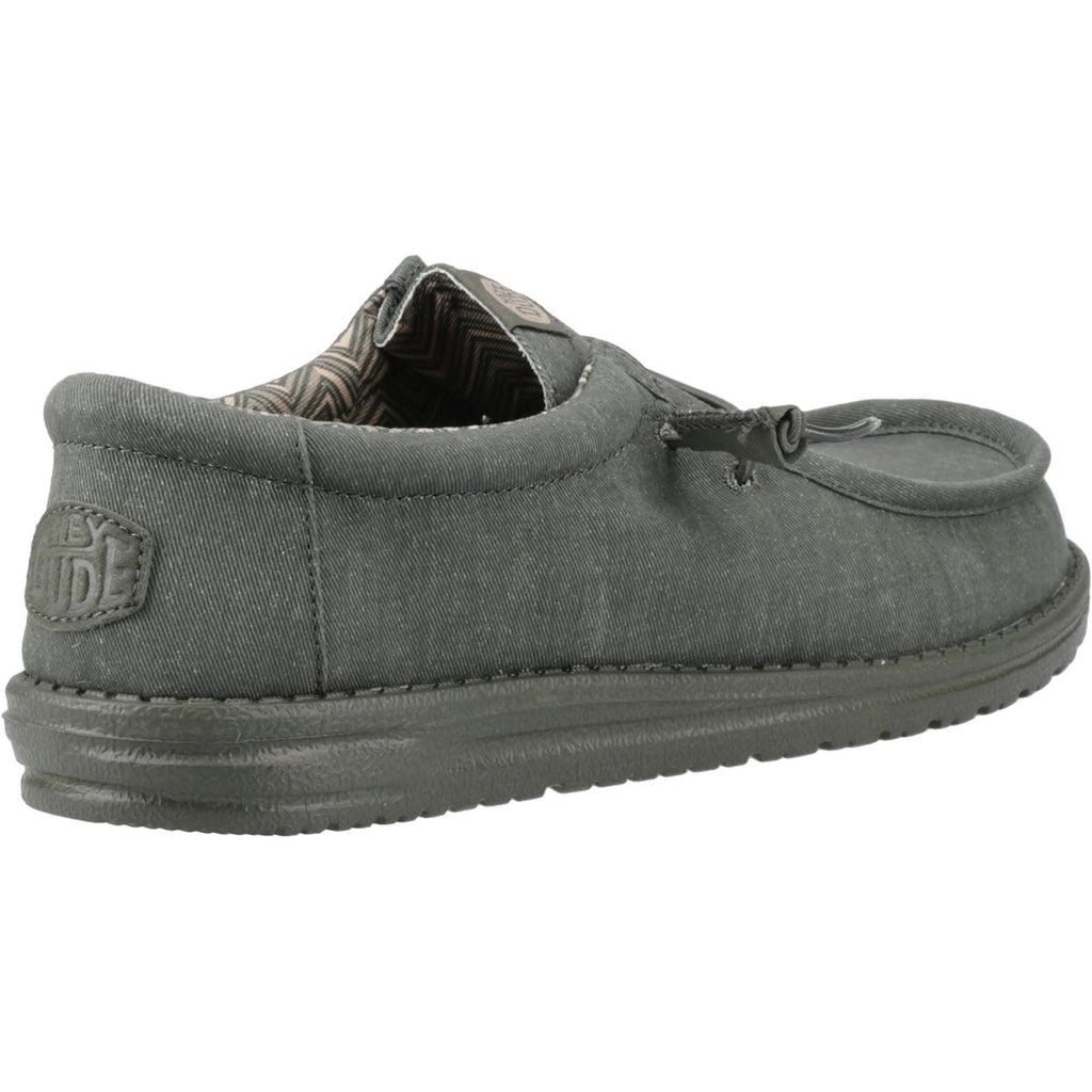 Hey Dude Wally men's slip-on shoe shown from rear three-quarter angle on white background