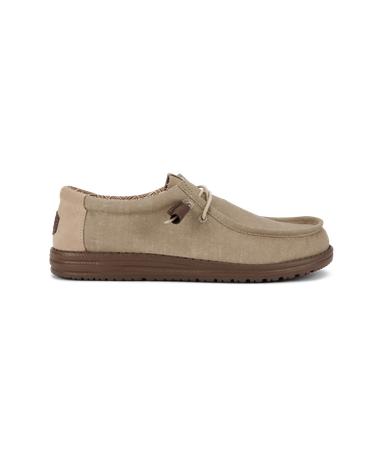 Hey Dude mens casual slip-on canvas shoe with lace detail and brown rubber sole