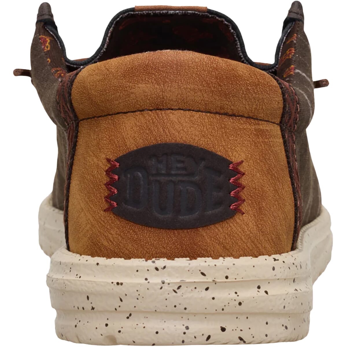 Rear view of Hey Dude Wally Western shoe showing heel logo and speckled white sole