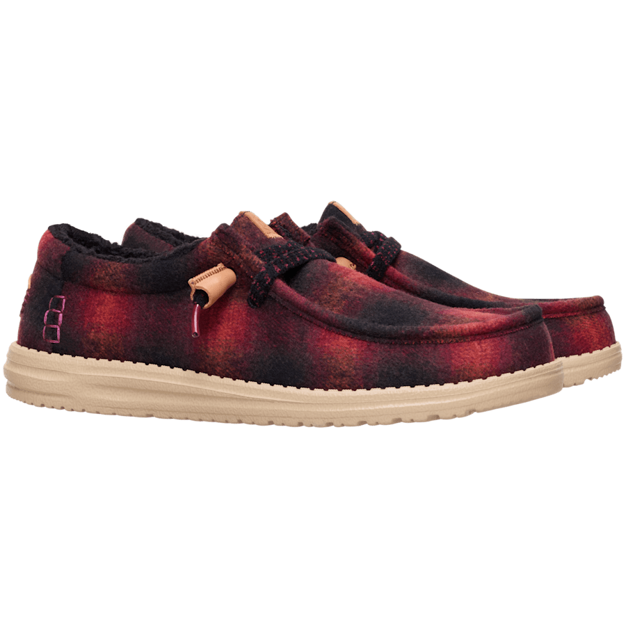 Hey Dude Wally Cozy Plaid slip-on shoes with plaid upper and cream sole, pair angled view